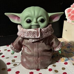 Green and Brown Kids Toy Figure